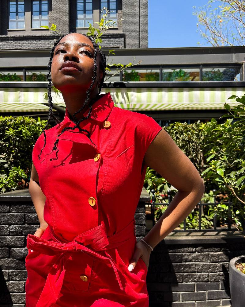 Woman wearing the Anna Elsabie Long Jumpsuit in cotton twill by Dr Pachanga Clothing, South Africa.