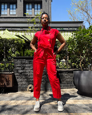 Woman wearing the Anna Elsabie Long Jumpsuit in cotton twill by Dr Pachanga Clothing, South Africa.