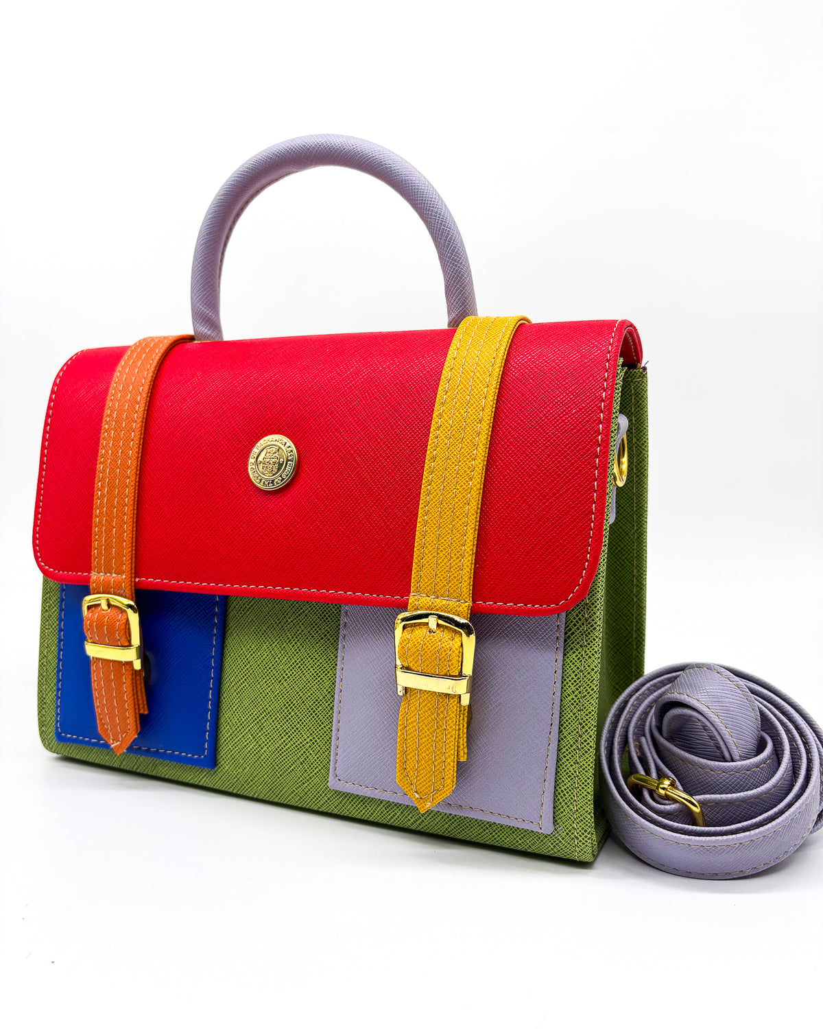 Green vegan leather handbag or crossbody bag, with African Wax fabric inlay, two gold buckles and a magnetic clasp.