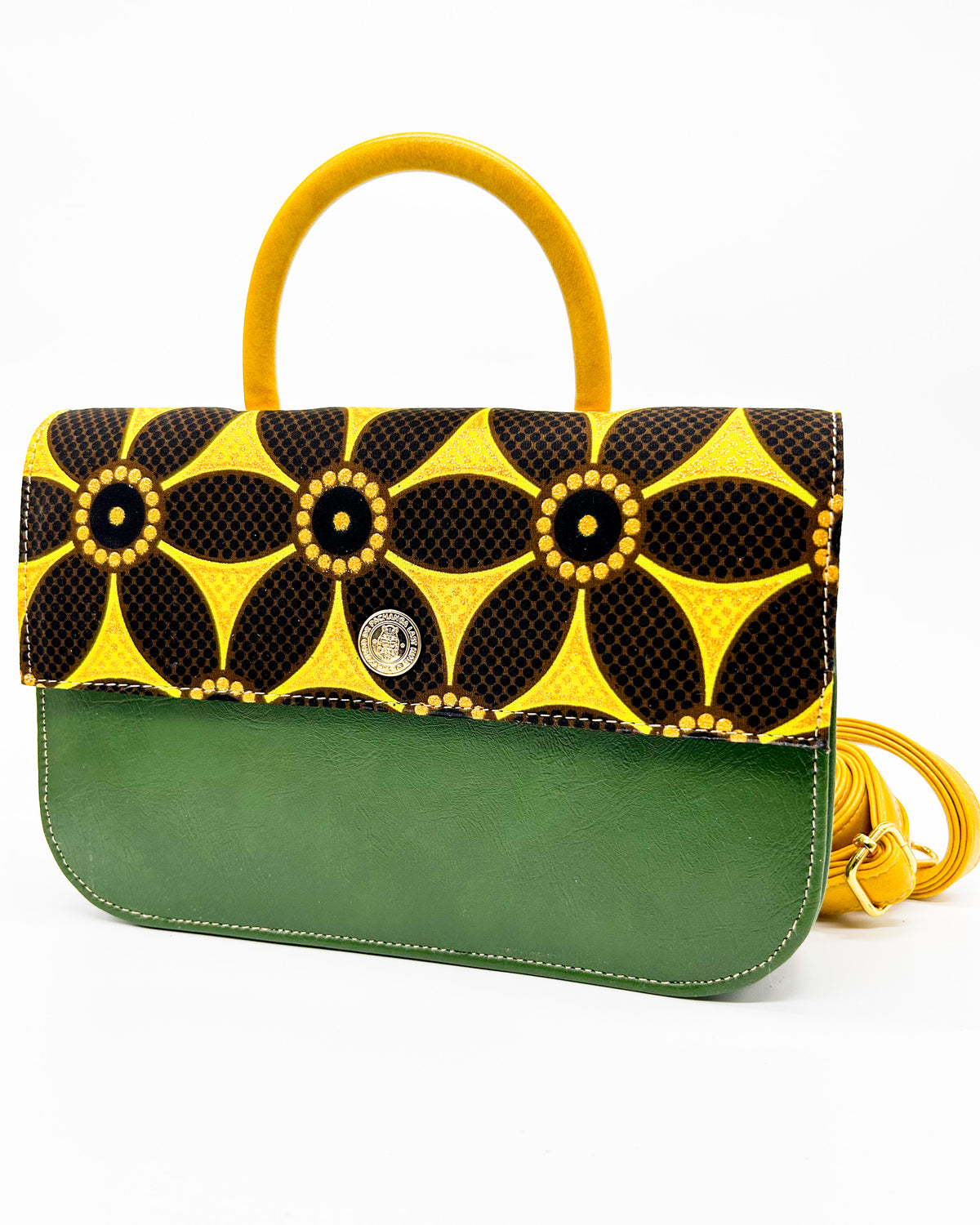 Olive green vegan leather handbag with yellow and black African Gold Wax fabric inlay, mustard accents, magnetic clasp and adjustable strap.