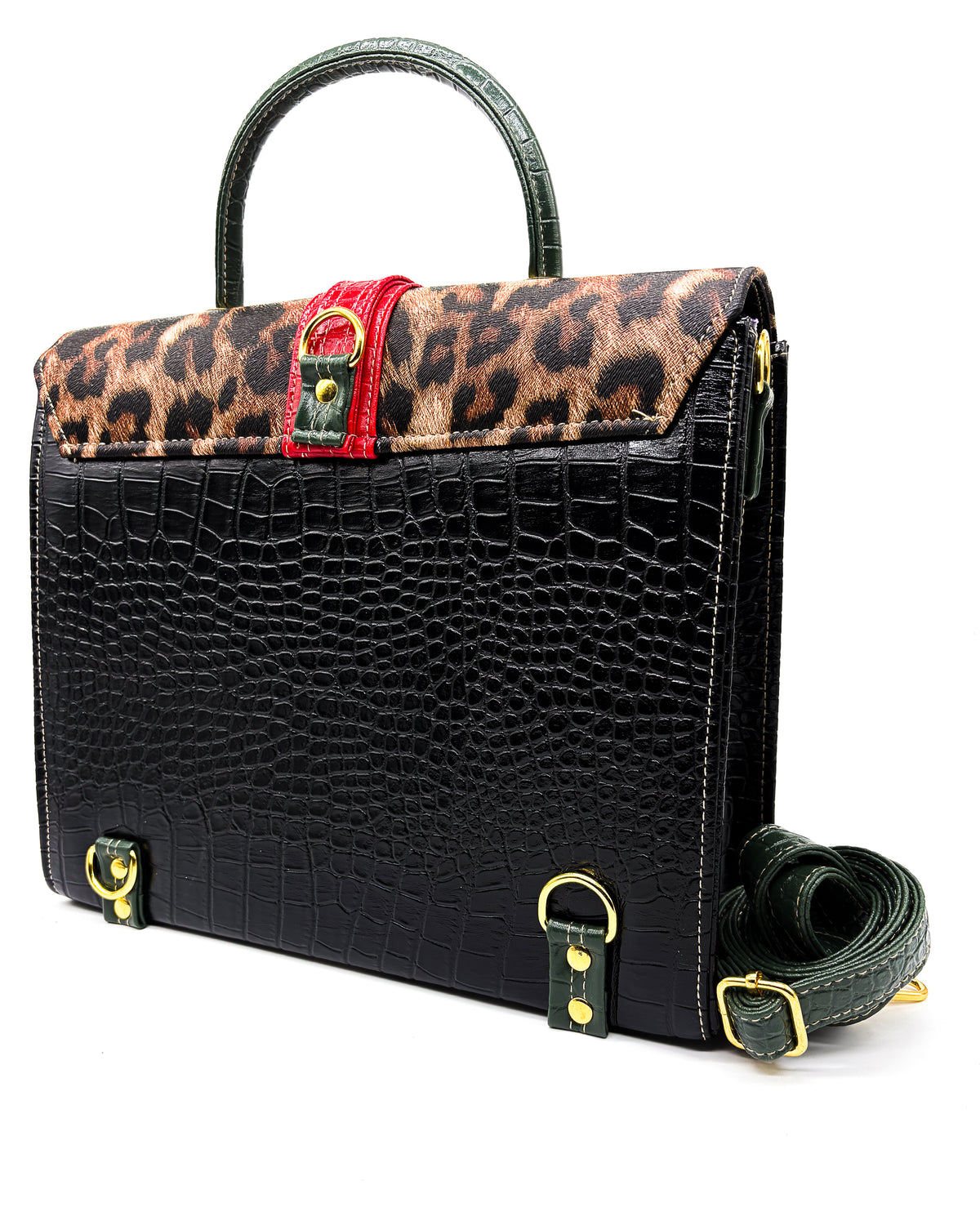 Back view, animal print vegan leather handbag, crossbody or backpack with African wax fabric accents, a gold buckle and a magnetic clasp.