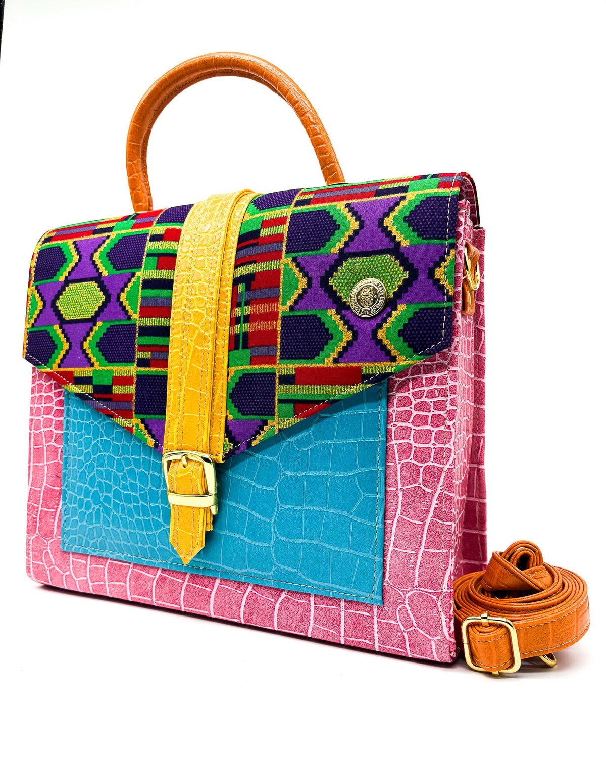 Pink and blue vegan leather handbag, crossbody or backpack with African wax fabric accents, a gold buckle and a magnetic clasp.
