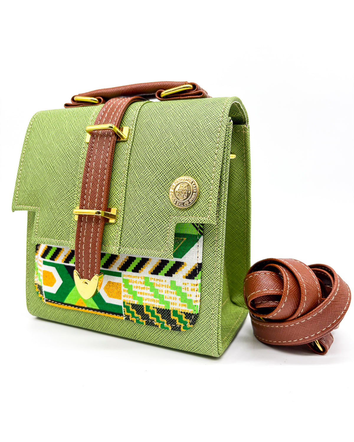 Green vegan leather handbag or crossbody bag with colouful African wax fabric inlay, and a gold magnetic clasp.