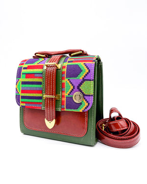 Green and maroon vegan leather handbag or crossbody bag with colourful gold African wax fabric inlay, and a gold magnetic clasp.